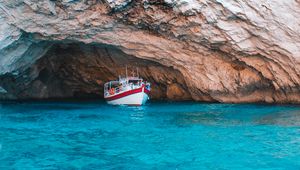 Preview wallpaper water, rock, boat, sea, bay, cave