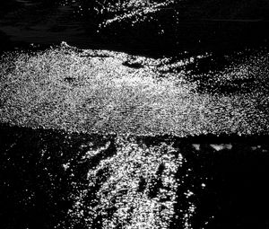 Preview wallpaper water, sea, ripples, glare, bw, dark