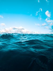 Preview wallpaper water, sea, ripples, waves, sky, blue, clouds