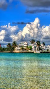 Preview wallpaper water, sky, clouds, houses