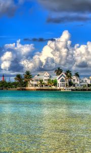 Preview wallpaper water, sky, clouds, houses