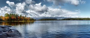 Preview wallpaper water, smooth surface, lake, trees, autumn, sky, clouds