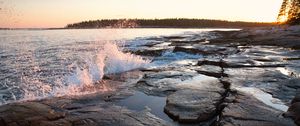 Preview wallpaper water, spray, shore, stones, sunset