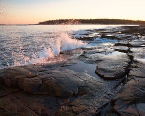 Preview wallpaper water, spray, shore, stones, sunset