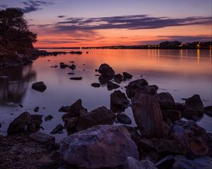 Preview wallpaper water, stones, horizon, sunset