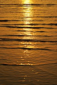 Preview wallpaper water, waves, glare, sunset, dark