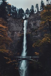 Preview wallpaper waterfall, cliff, bridge, trees, water