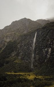 Preview wallpaper waterfall, cliff, fog, new zealand
