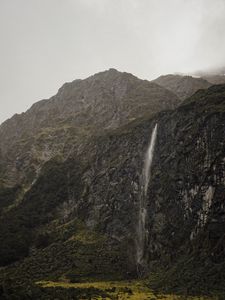 Preview wallpaper waterfall, cliff, fog, new zealand