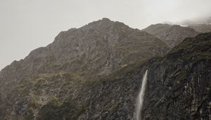 Preview wallpaper waterfall, cliff, fog, new zealand