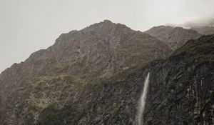 Preview wallpaper waterfall, cliff, fog, new zealand