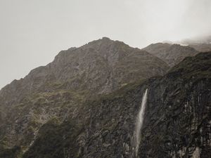 Preview wallpaper waterfall, cliff, fog, new zealand