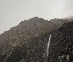 Preview wallpaper waterfall, cliff, fog, new zealand