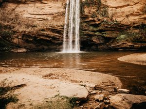 Preview wallpaper waterfall, cliff, river, stones, shore