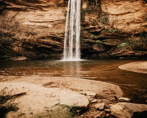 Preview wallpaper waterfall, cliff, river, stones, shore