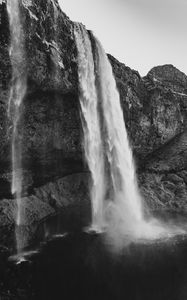 Preview wallpaper waterfall, cliff, rocks, black and white, nature