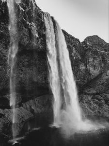 Preview wallpaper waterfall, cliff, rocks, black and white, nature