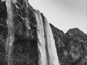 Preview wallpaper waterfall, cliff, rocks, black and white, nature