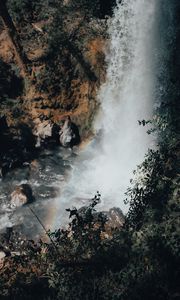 Preview wallpaper waterfall, cliff, stones, spray, rainbow