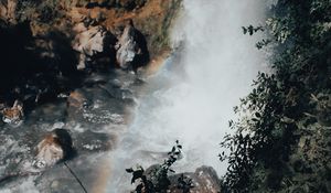 Preview wallpaper waterfall, cliff, stones, spray, rainbow