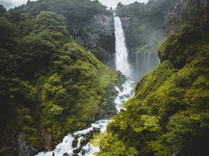 Preview wallpaper waterfall, cliff, trees, stones, nature, landscape