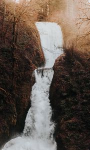 Preview wallpaper waterfall, flow, water, grass, branches, autumn