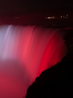 240x320 Wallpaper waterfall, fog, backlight, red, dark