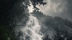 Preview wallpaper waterfall, fog, branches, current, break, rock