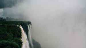 Preview wallpaper waterfall, fog, cliff, grass, greens