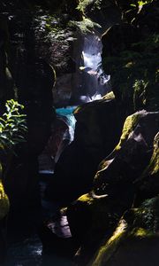 Preview wallpaper waterfall, gorge, rocks, branches, water