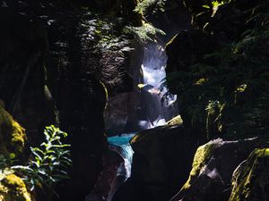 Preview wallpaper waterfall, gorge, rocks, branches, water