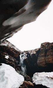 Preview wallpaper waterfall, gorge, snow, rocks