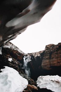 Preview wallpaper waterfall, gorge, snow, rocks