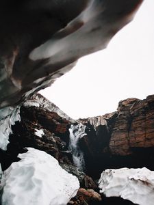 Preview wallpaper waterfall, gorge, snow, rocks