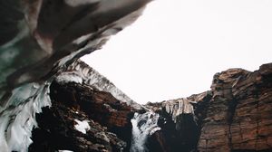 Preview wallpaper waterfall, gorge, snow, rocks