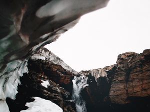 Preview wallpaper waterfall, gorge, snow, rocks