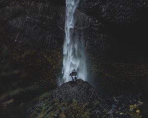 Preview wallpaper waterfall, human, rock, cliff, water