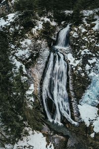 Preview wallpaper waterfall, ice, aerial view, snow, winter, forest, trees, branches