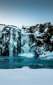 Preview wallpaper waterfall, ice, snow, winter, cliff, twilight