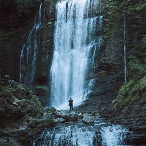 Preview wallpaper waterfall, man, alone, nature