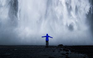 Preview wallpaper waterfall, man, silhouette, cliff, water