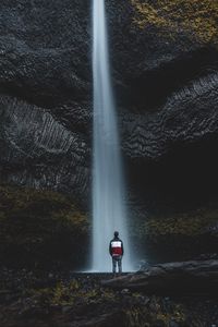 Preview wallpaper waterfall, man, water, rock, stones