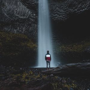 Preview wallpaper waterfall, man, water, rock, stones