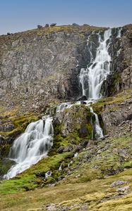 Preview wallpaper waterfall, mountain, cliff, stones, nature