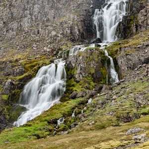 Preview wallpaper waterfall, mountain, cliff, stones, nature