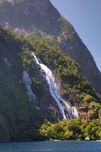Preview wallpaper waterfall, mountain, trees, sea