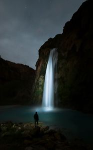 Preview wallpaper waterfall, night, man, river