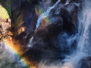 Preview wallpaper waterfall, rainbow, aerial view, water, stones, cliff