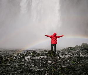 Preview wallpaper waterfall, rainbow, spray, water, man