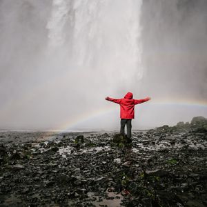 Preview wallpaper waterfall, rainbow, spray, water, man